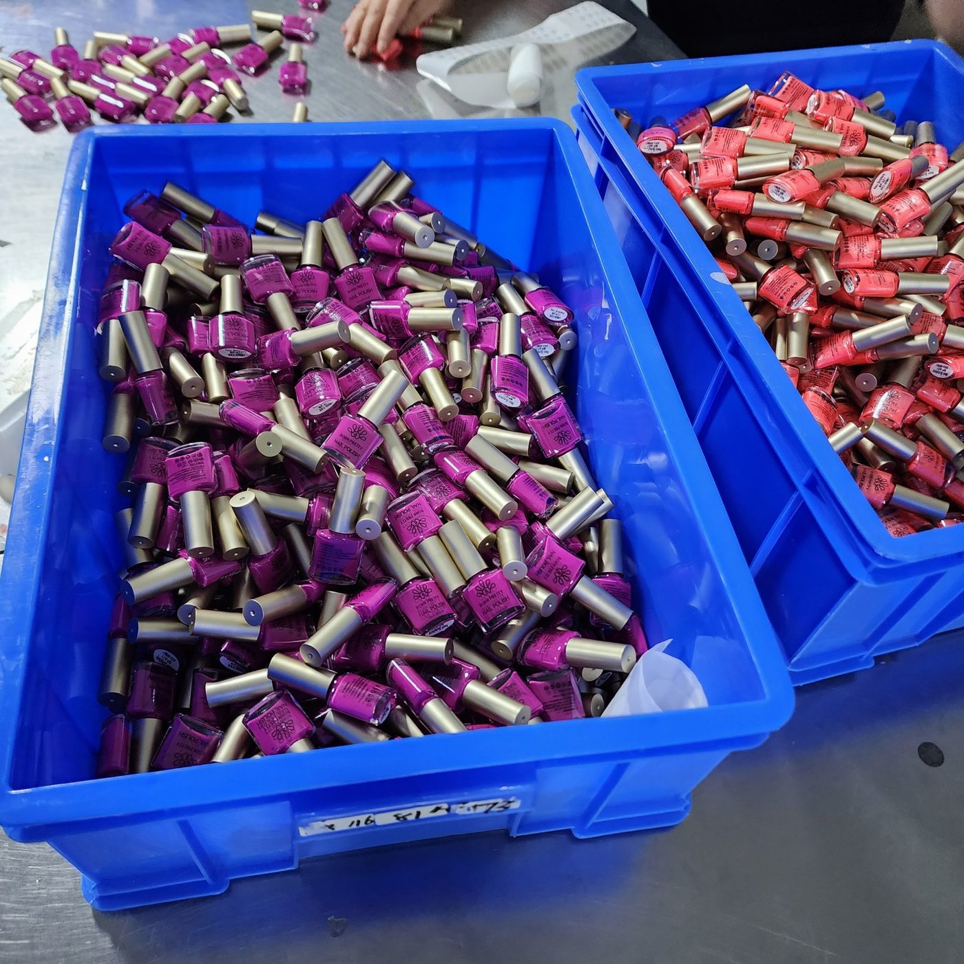 Water-based nail polish bottles in small-batch production